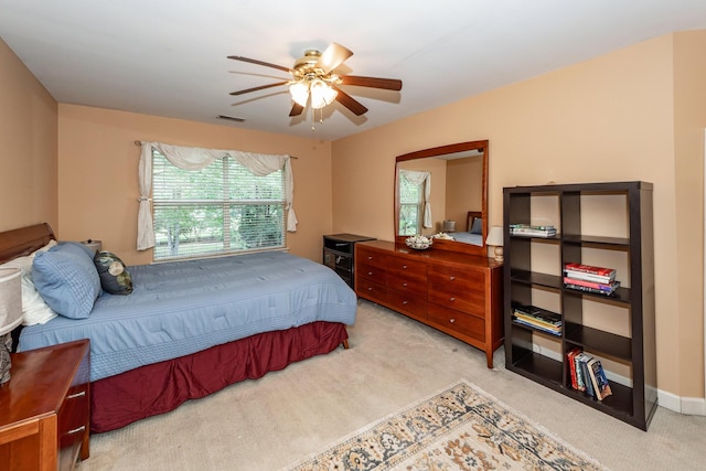 477 Commonwealth Rd, Mount Pleasant, SC 29466 - bedroom with light colored carpet and ceiling fan
