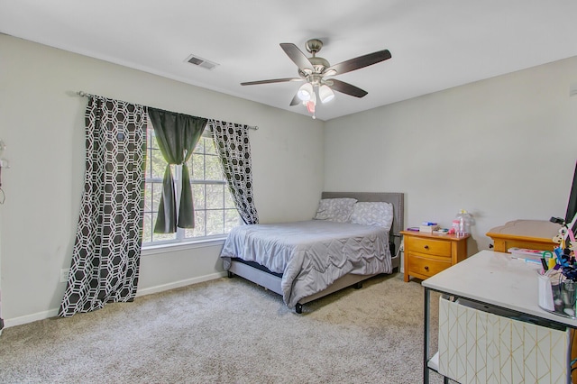 bedroom with a ceiling fan, baseboards, carpet, and visible vents