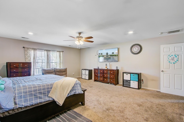 bedroom featuring visible vents, baseboards, a ceiling fan, and carpet flooring