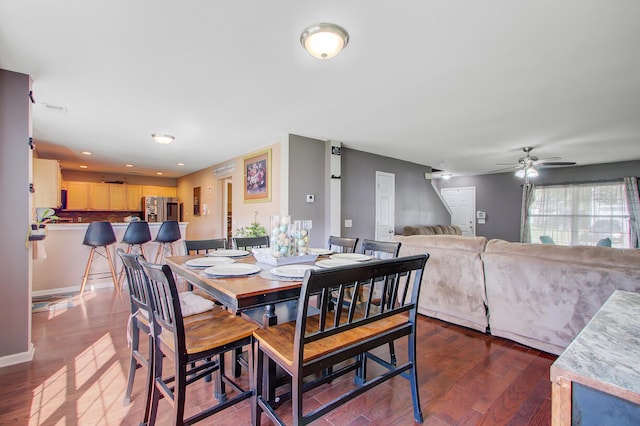 dining space featuring recessed lighting, ceiling fan, baseboards, and wood finished floors