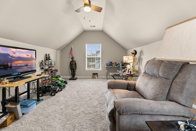 living room featuring vaulted ceiling, carpet, and ceiling fan