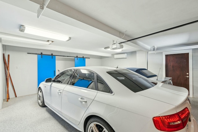 garage with a garage door opener and a wall mounted AC