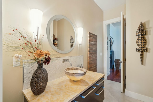 bathroom with tile patterned floors and sink