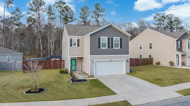 view of front of home featuring a chimney, an attached garage, a front yard, fence, and driveway