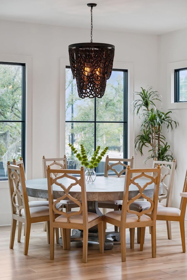 231 Bayview Dr, Mount Pleasant, SC 29464 - dining area featuring a chandelier and light wood finished floors