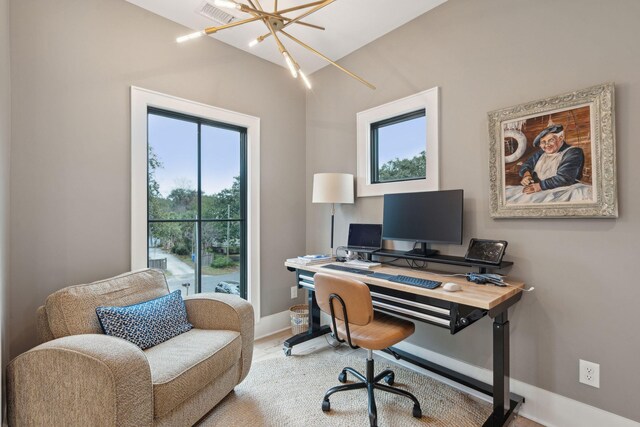 231 Bayview Dr, Mount Pleasant, SC 29464 - office area featuring baseboards, a chandelier, and wood finished floors