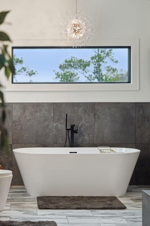 231 Bayview Dr, Mount Pleasant, SC 29464 - bathroom featuring plenty of natural light and a freestanding tub