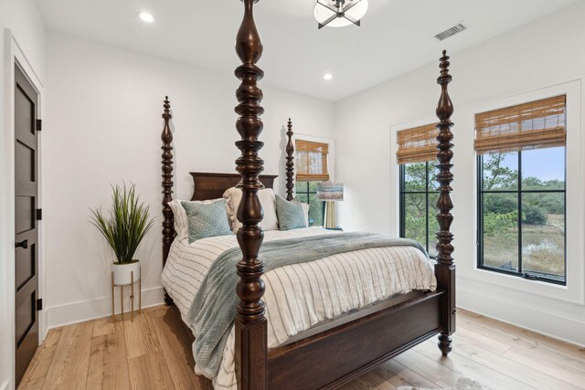 231 Bayview Dr, Mount Pleasant, SC 29464 - bedroom with baseboards, light wood-style flooring, and recessed lighting