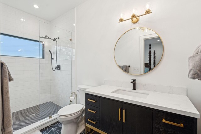 231 Bayview Dr, Mount Pleasant, SC 29464 - bathroom with vanity, toilet, a tile shower, and recessed lighting