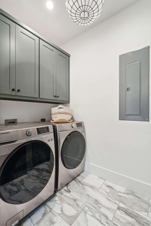 231 Bayview Dr, Mount Pleasant, SC 29464 - laundry room with electric panel, cabinet space, independent washer and dryer, light marble finish flooring, and recessed lighting