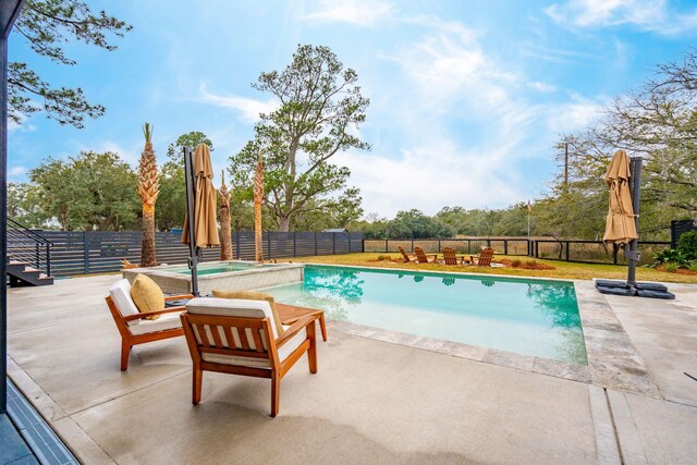 231 Bayview Dr, Mount Pleasant, SC 29464 - view of swimming pool featuring a fenced backyard, a patio, and a pool with connected hot tub