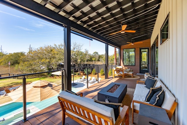 231 Bayview Dr, Mount Pleasant, SC 29464 - sunroom with an outdoor living space with a fire pit, ceiling fan, and vaulted ceiling
