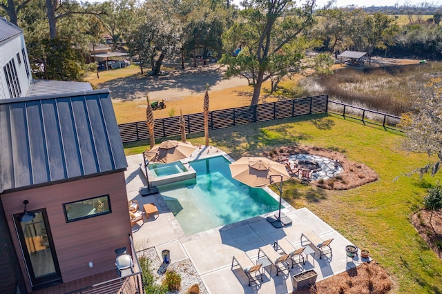 231 Bayview Dr, Mount Pleasant, SC 29464 - view of pool featuring a fire pit, a fenced backyard, a patio, and a pool with connected hot tub