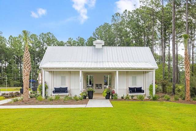 view of front of home featuring a porch and a front yard