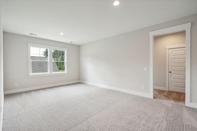 view of carpeted spare room