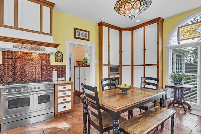 dining room with light tile patterned floors