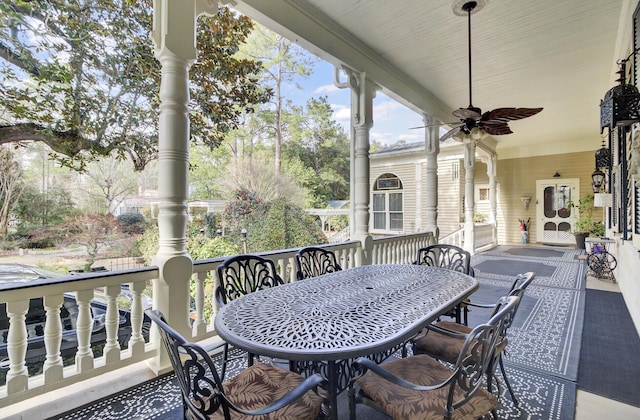 exterior space with a ceiling fan