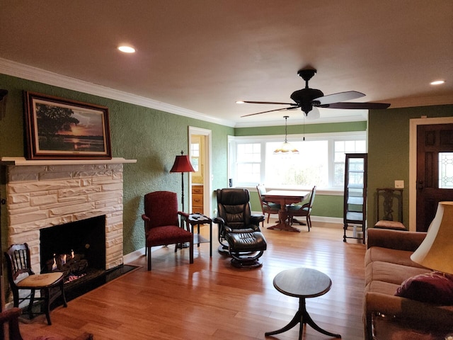 1216 Eastwood Ave, Hanahan, SC 29410 - living room with crown molding, a ceiling fan, baseboards, and wood finished floors