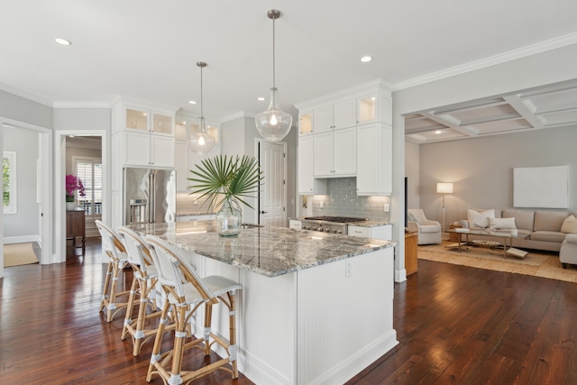 591 Island Walk E, Mount Pleasant, SC 29464 - kitchen featuring high end refrigerator, backsplash, dark wood-style floors, white cabinets, and recessed lighting