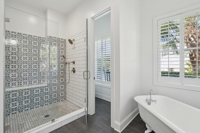 591 Island Walk E, Mount Pleasant, SC 29464 - full bathroom with a shower stall, a freestanding bath, and wood finished floors