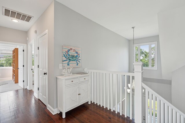 591 Island Walk E, Mount Pleasant, SC 29464 - hallway with an upstairs landing, dark wood finished floors, plenty of natural light, and recessed lighting