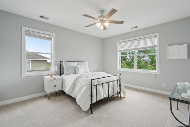 591 Island Walk E, Mount Pleasant, SC 29464 - bedroom featuring light colored carpet and a ceiling fan