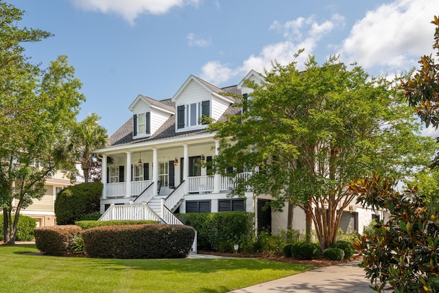 591 Island Walk E, Mount Pleasant, SC 29464 - view of front of house with covered porch, a front lawn, and stairs