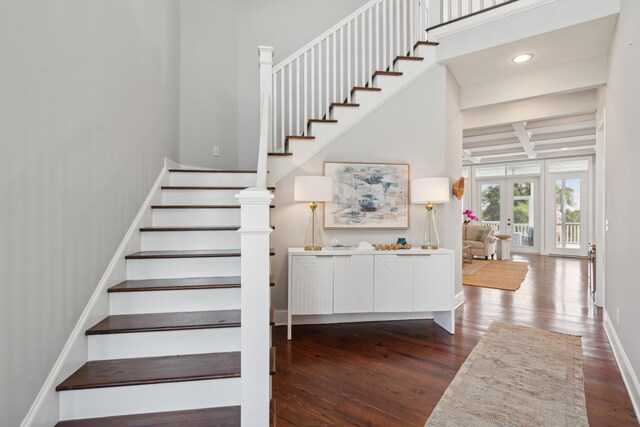 591 Island Walk E, Mount Pleasant, SC 29464 - stairs with french doors, wood finished floors, beam ceiling, coffered ceiling, and recessed lighting