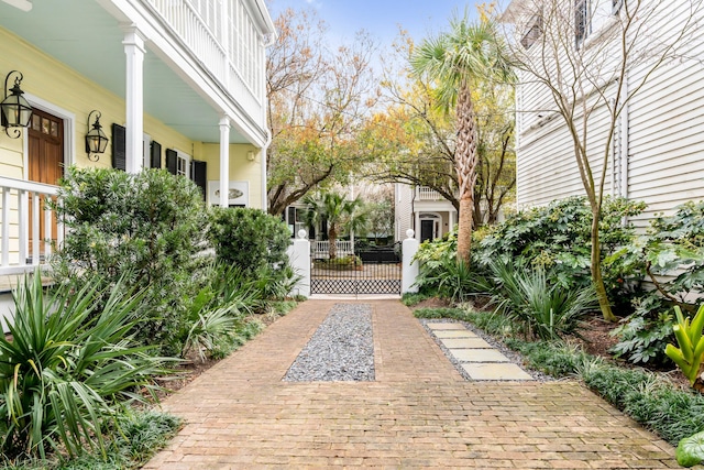 surrounding community with a gate and fence