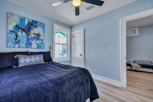 bedroom featuring hardwood / wood-style floors and ceiling fan