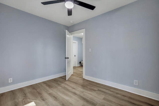 empty room featuring light hardwood / wood-style floors and ceiling fan