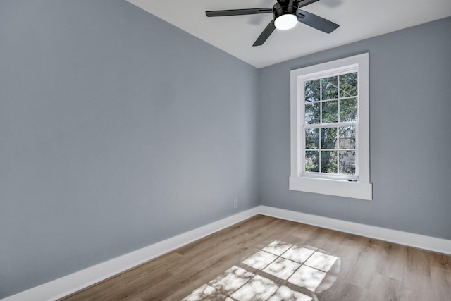 spare room with ceiling fan and light hardwood / wood-style floors