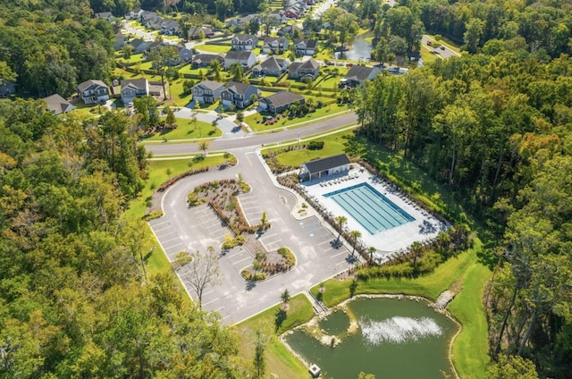 bird's eye view with a residential view and a water view