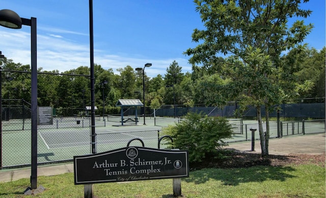 view of sport court with fence