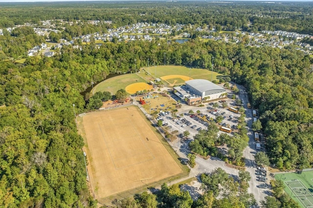 bird's eye view featuring a view of trees