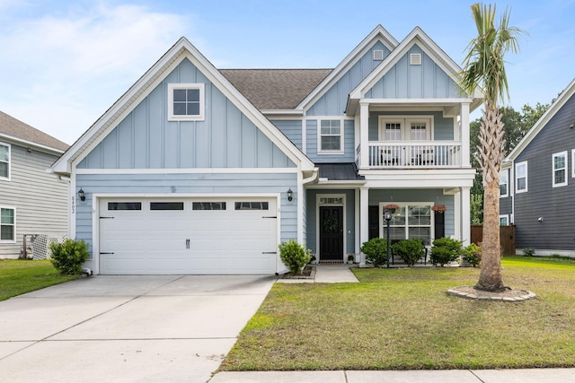 8402 Loggers Run, North Charleston, SC 29420 - craftsman inspired home featuring board and batten siding, a balcony, a front lawn, driveway, and roof with shingles