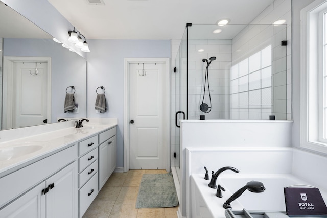 8402 Loggers Run, North Charleston, SC 29420 - bathroom with a shower stall, a bath, double vanity, and tile patterned floors
