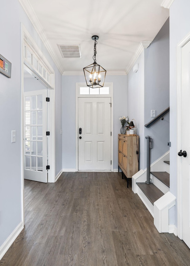 8402 Loggers Run, North Charleston, SC 29420 - foyer featuring a chandelier, dark wood-type flooring, stairway, ornamental molding, and baseboards