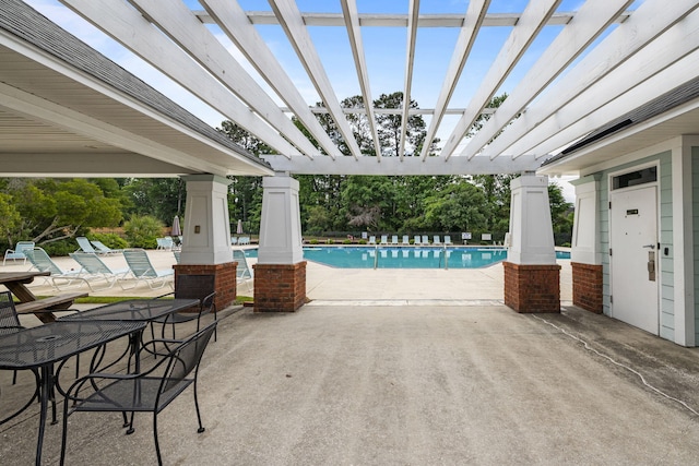 8402 Loggers Run, North Charleston, SC 29420 - view of patio / terrace with a pergola and a community pool