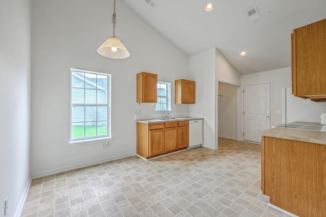 206 Barnwell St, Summerville, SC 29483 - kitchen featuring white appliances, high vaulted ceiling, light countertops, baseboards, and a sink