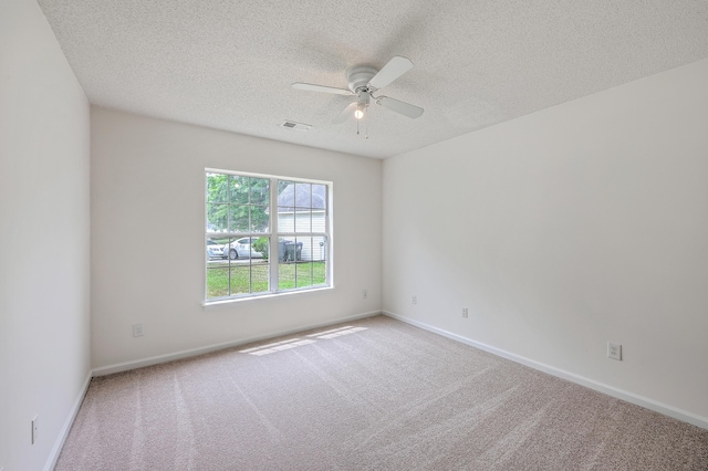 206 Barnwell St, Summerville, SC 29483 - carpeted spare room with a ceiling fan, a textured ceiling, and baseboards