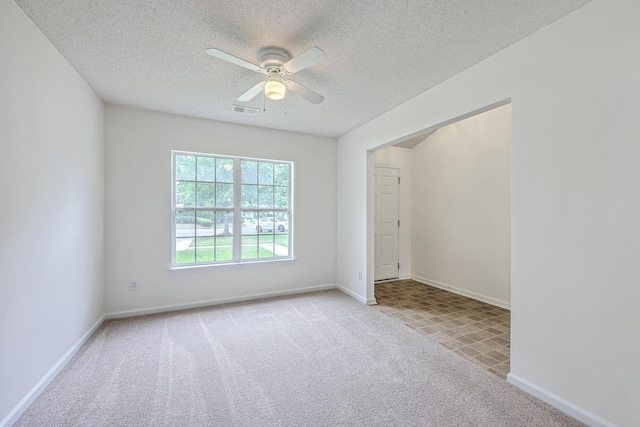 206 Barnwell St, Summerville, SC 29483 - spare room with a textured ceiling, carpet, ceiling fan, and baseboards