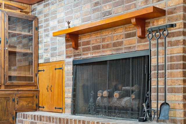 interior details featuring a fireplace