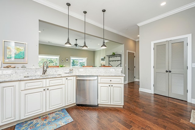 kitchen featuring dark wood-type flooring, light stone counters, dishwasher, a sink, and hanging light fixtures