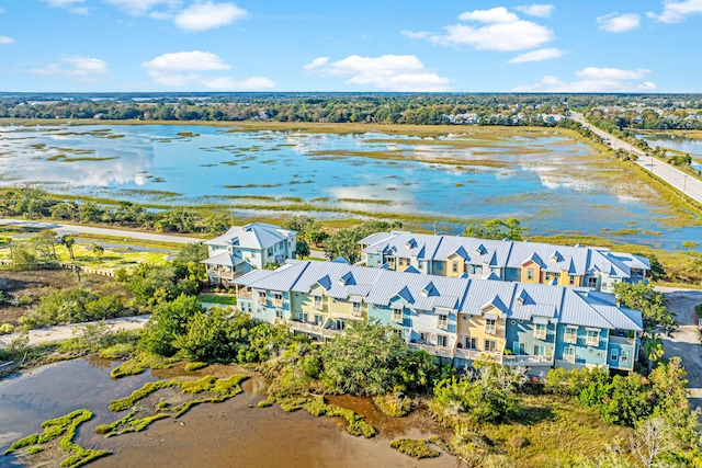 bird's eye view featuring a water view and a residential view