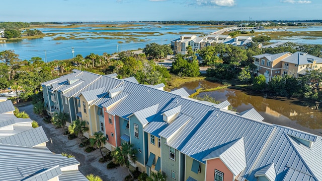 bird's eye view featuring a water view and a residential view