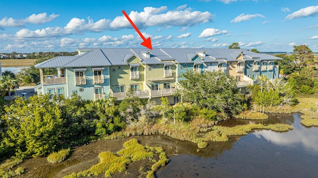 drone / aerial view featuring a water view
