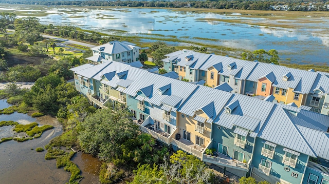 birds eye view of property with a residential view and a water view
