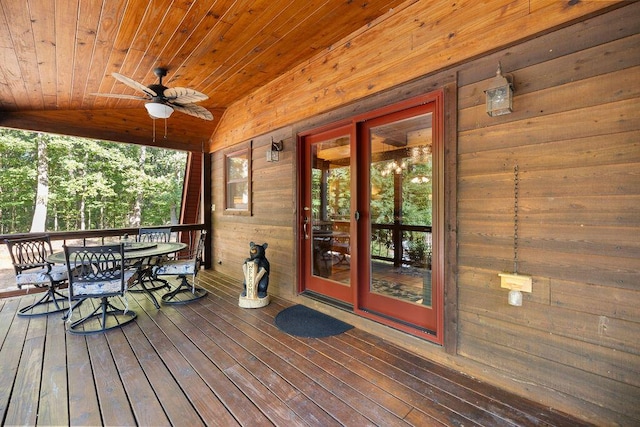 wooden terrace with ceiling fan and french doors