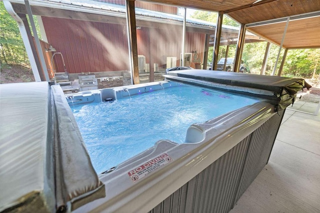 view of pool featuring an outdoor kitchen